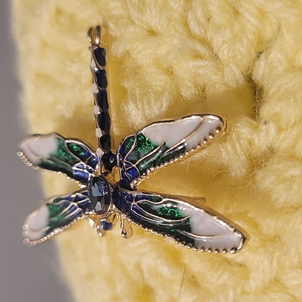 Dragonfly brooch. Vibrant colors with sapphire color crystal centerpiece